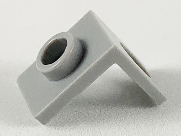 Light Bluish Gray Minifigure Neck Bracket with Back Stud - Thick Back Wall