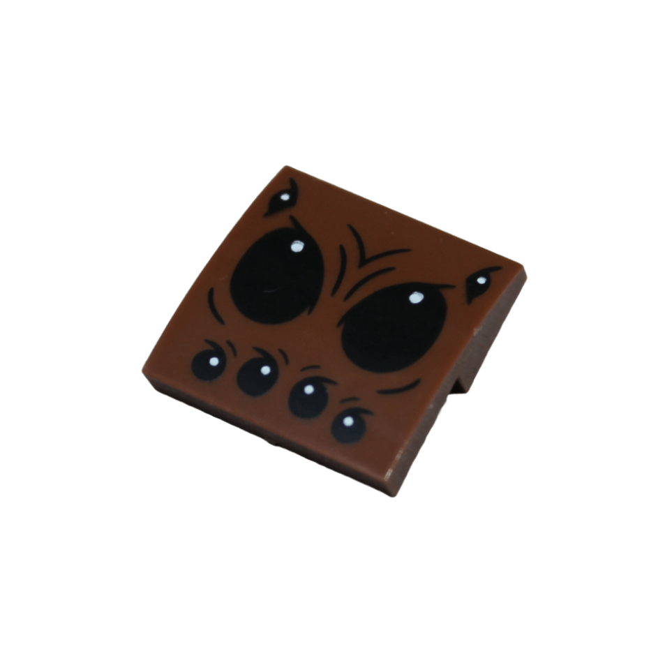 Reddish Brown Slope, Curved 2 x 2 x 2/3 with Black Spider Eyes and White Pupils Pattern