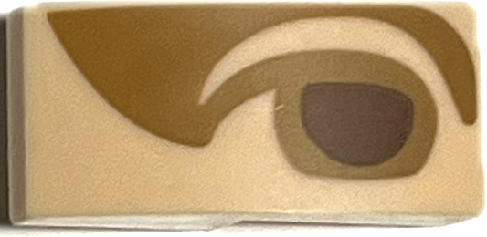 Light Nougat Slope, Curved 2 x 1 x 2/3 with Reddish Brown Right Eye with Medium Nougat Eyelid and Shadow Pattern (Mona Lisa)