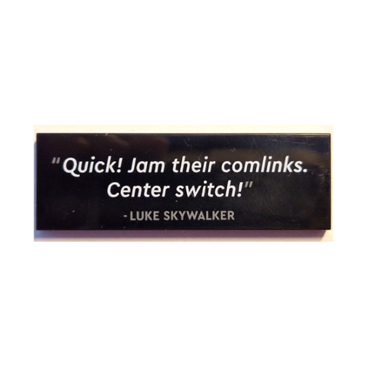 Black Tile 2 x 6 with '"Quick! Jam their comlinks. Center switch!" - LUKE SKYWALKER' Pattern